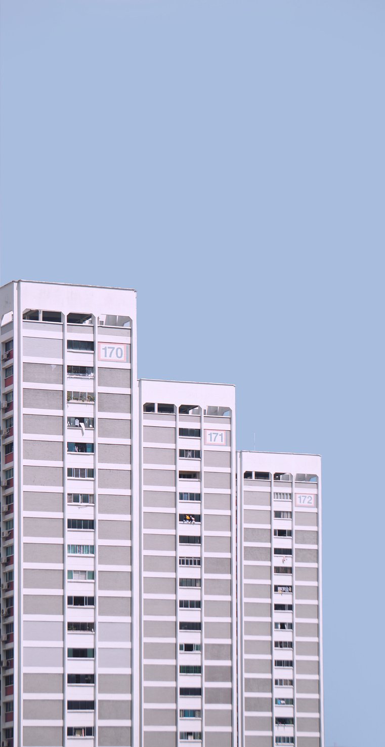 White Concrete Building Under Blue Sky